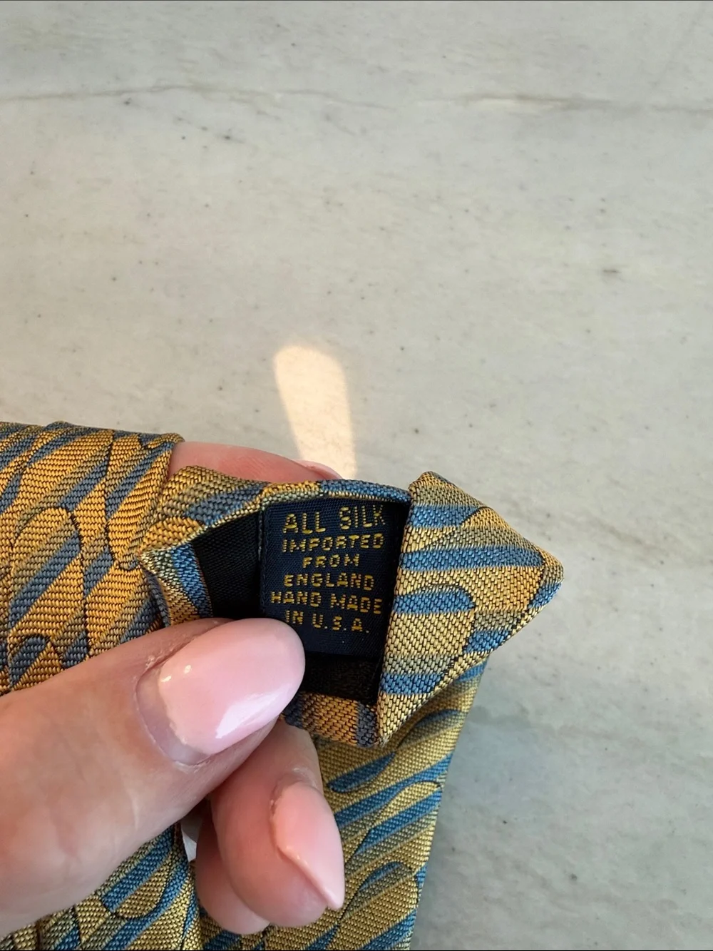 XMI Gold silk Tie with Blue Wave Pattern